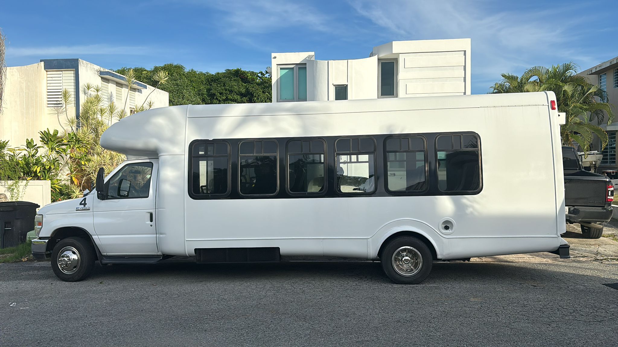DP Transport white shuttle bus for excursion transportation