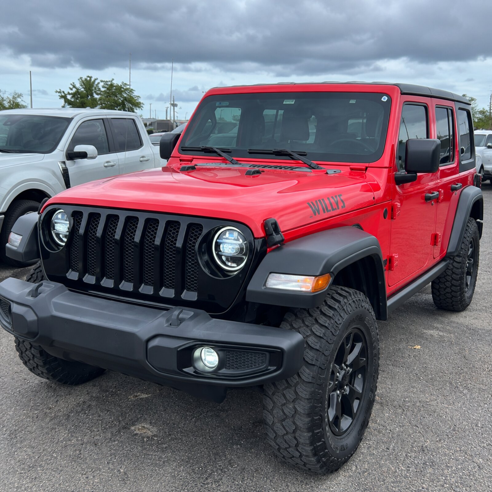 Red Jeep Wrangler Willys available for daily rental in Puerto Rico